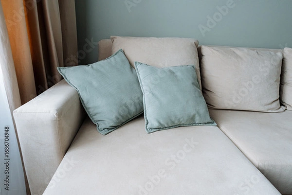 Fototapeta An Elegant and Cozy Seating Arrangement featuring Soft Cushions that ensures both comfort and style, perfect for creating a serene and inviting environment in any living space