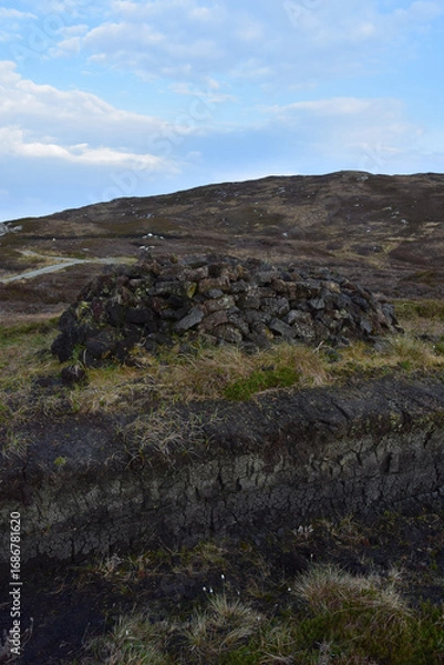 Obraz Peat Bricks Stacked in a Pile Drying