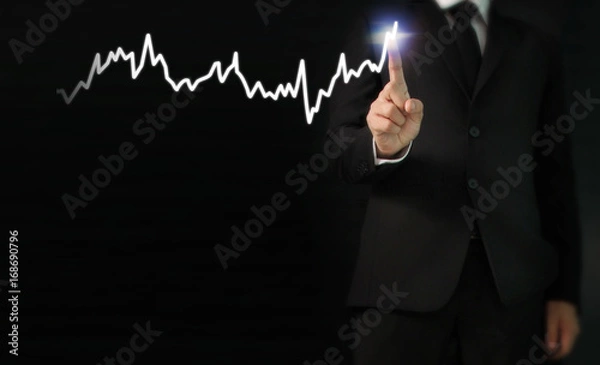 Fototapeta hand with stock financial chart symbols coming from hand