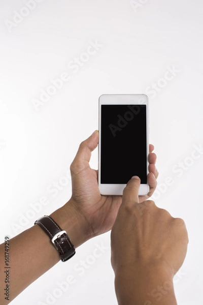 Fototapeta Isolated image of hands holding mobile phone and touching screen on white background