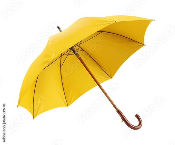 Fototapeta Bright yellow umbrella with a curved wooden handle open against a