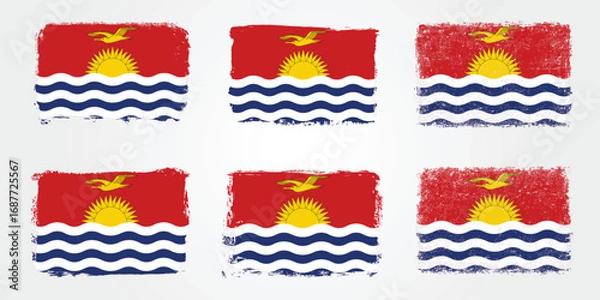 Fototapeta Grunge style Kiribati flags with ocean waves, sun, and frigate bird