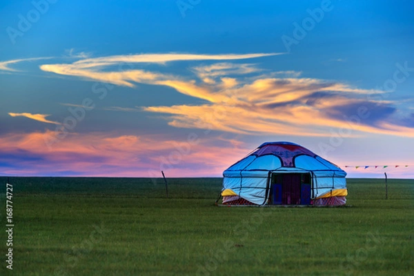 Obraz Mongolian traditional houses in immense grassland.They call these tents as ''Yurt''