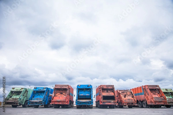 Fototapeta Several cars parked garbage truck for transport to garbage collection.
