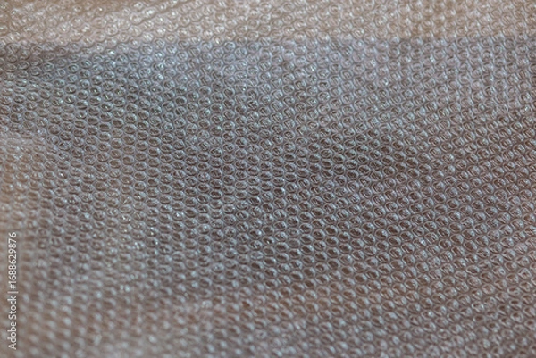 Fototapeta Texture of bubble wrap. Lumpy background. Close-up of packaging material. Protective Packaging Film