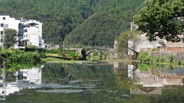 Fototapeta The old architectures view with the traditional Chinese style in the countryside of the China
