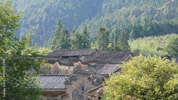 Fototapeta The old architectures view with the traditional Chinese style in the countryside of the China
