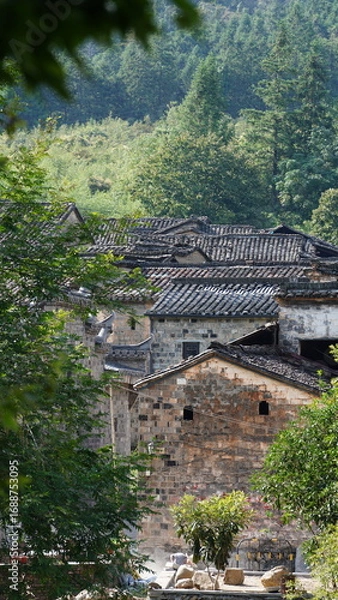 Fototapeta The old architectures view with the traditional Chinese style in the countryside of the China
