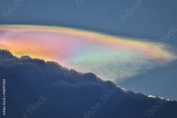 Obraz fire rainbow cloud phenomenon is a natural phenomenon called irisation or iridescence.