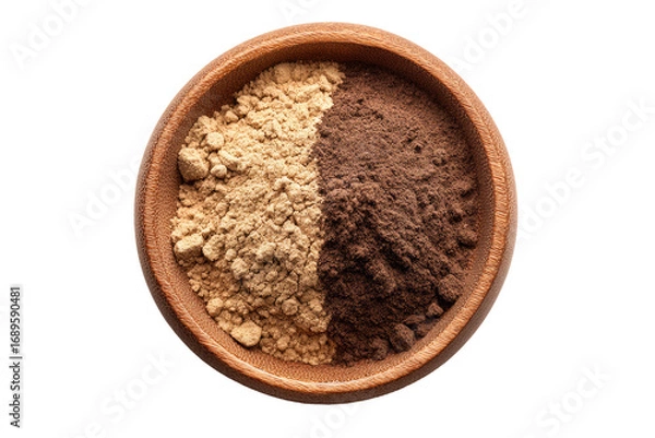 Fototapeta Two light and dark spice powders in a wooden bowl