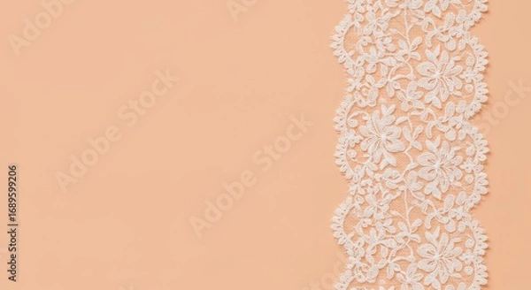 Fototapeta Elegant White Lace Border on Peach Background - Delicate white lace trim on a peach colored backdrop. Perfect for invitations, cards, or fabric design