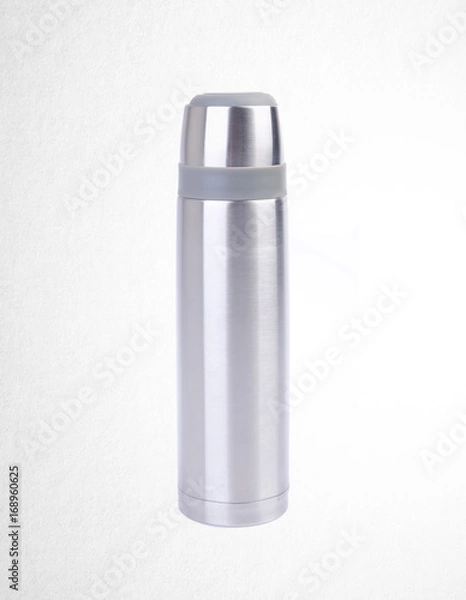 Obraz Thermo or Thermo flask from stainless stee on background.