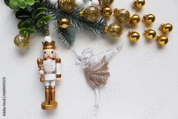 Obraz christmas card for children. ballerina and nutcracker figurine on christmas tree	