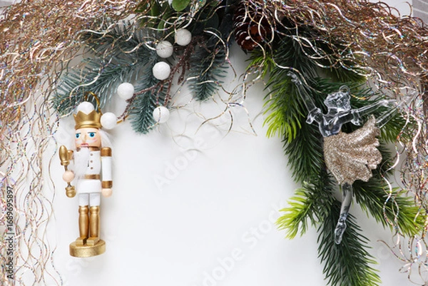 Obraz christmas card for children. ballerina and nutcracker figurine on christmas tree	