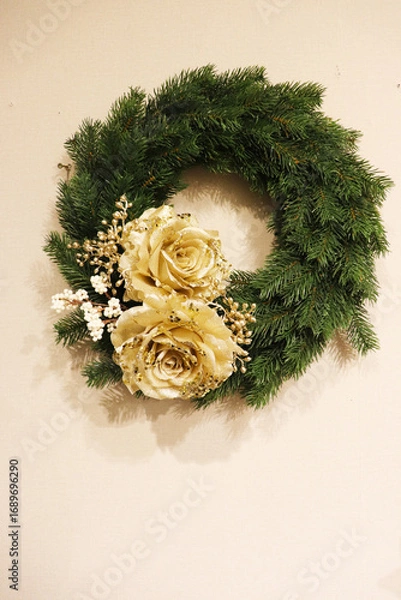 Fototapeta traditional Christmas wreath made of fir branches	