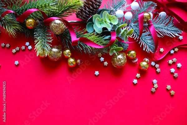 Fototapeta Christmas card design made of fir branches, tinsel and Christmas balls