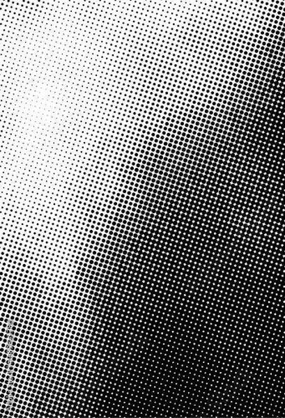 Fototapeta Abstract halftone gradient texture with black dots on white background, perfect for retro comics, vintage posters, print design, and backgrounds.
