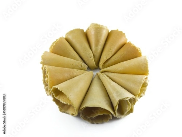 Fototapeta Semprong cake, sapit, sepit, Dutch cake, gapit, kassipi, kapit, Asian egg roll. A waffle or pastry snack originating from Indonesia. Semprong cake isolated on a white background.