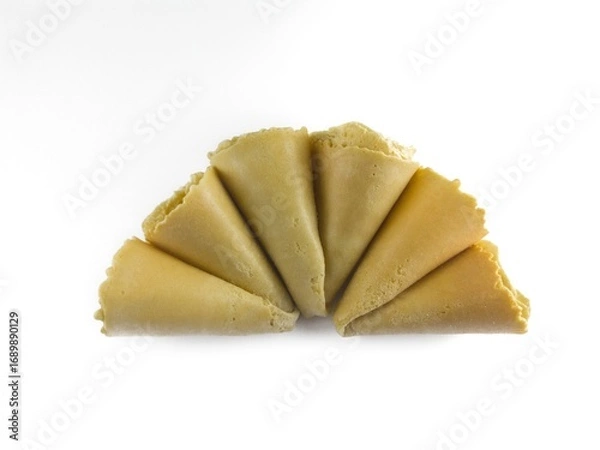 Fototapeta Semprong cake, sapit, sepit, Dutch cake, gapit, kassipi, kapit, Asian egg roll. A waffle or pastry snack originating from Indonesia. Semprong cake isolated on a white background.