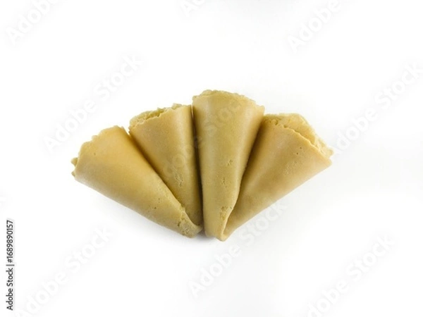 Fototapeta Semprong cake, sapit, sepit, Dutch cake, gapit, kassipi, kapit, Asian egg roll. A waffle or pastry snack originating from Indonesia. Semprong cake isolated on a white background.