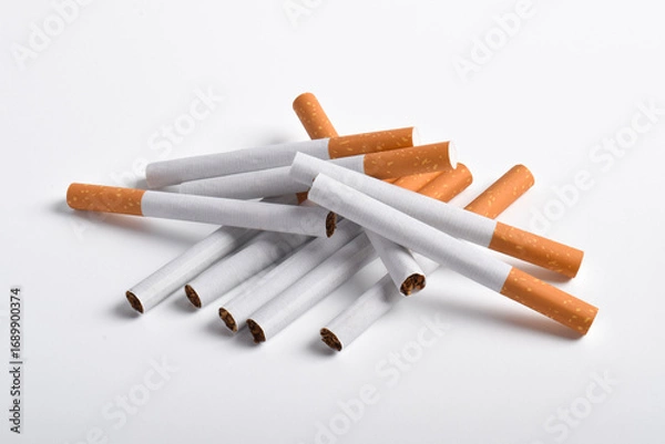 Fototapeta Pile of cigarettes isolated on white background