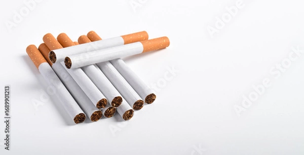 Fototapeta Pile of cigarettes with filters isolated on white background
