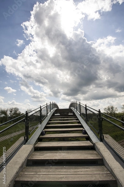 Fototapeta Zamosc - Renaissance city in Central Europe. Footbridge above a railway line.