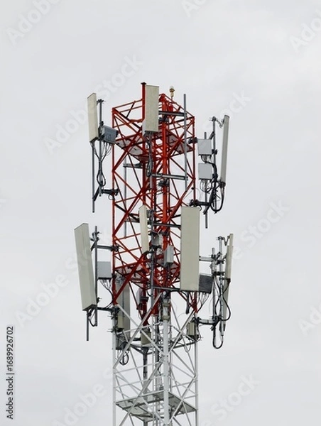 Fototapeta Telecommunication tower of 4G and 5G cellular. Base Station or Base Transceiver Station. Wireless Communication Antenna Transmitter. Telecommunication tower with antennas isolated on white background