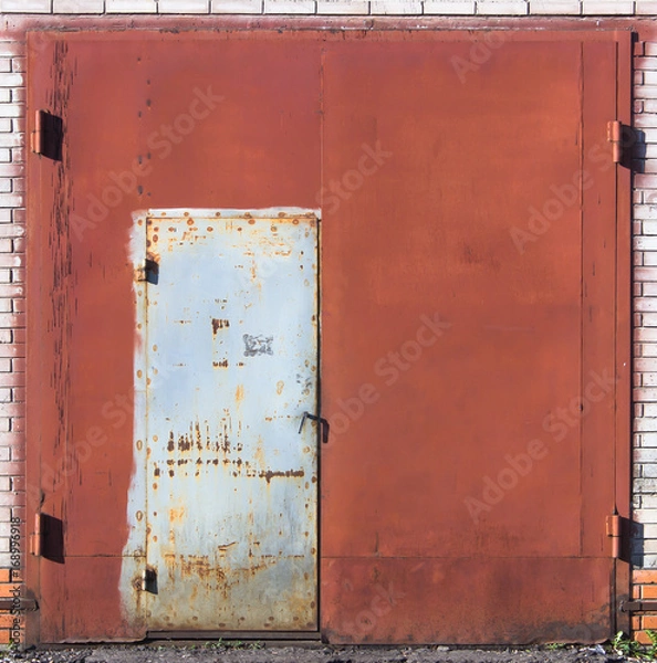 Fototapeta Metal gate with wicket door