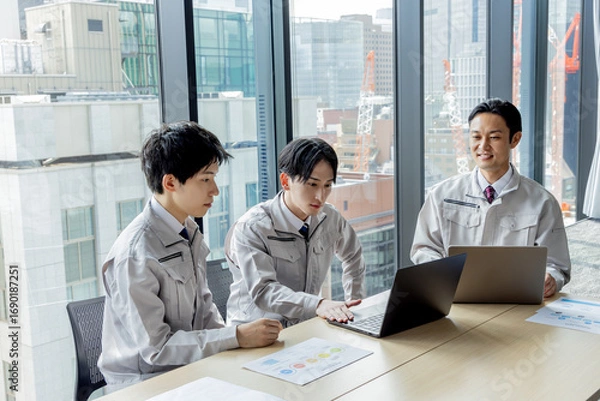 Fototapeta 作業服のスタッフ