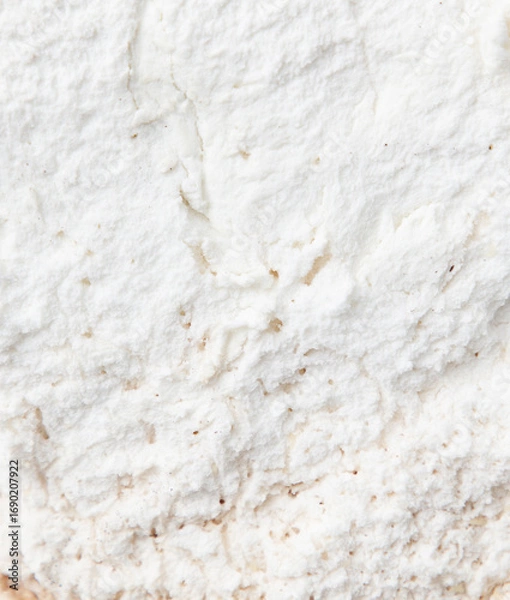 Fototapeta White flesh of a mushroom as an abstract background. The mushroom is eaten by worms