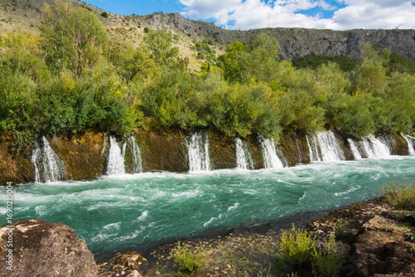 Fototapeta The Confluence of Neretva and Buna River have remarkable river gorge along with tufa waterfalls, Mostar, Bosnia and Herzegovina