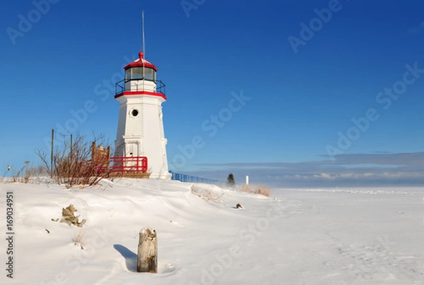 Fototapeta Cheboygan Crib Light is a light that marks the west pier head of the mouth of the Cheboygan River into Lake Huron in Cheboygan, Michigan, USA.