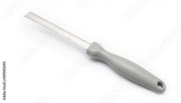 Obraz Kitchen tool with gray handle and serrated blade for cutting  
