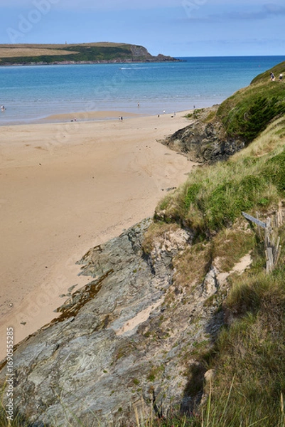 Fototapeta The beach at Rock, Cornwall on a sunny summer's day.