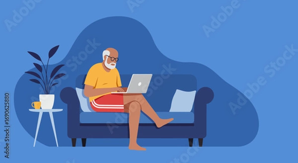 Fototapeta Senior man with glasses using laptop on a cozy couch at home. Illustrates remote work, active aging, leisure, and a connected, modern lifestyle.