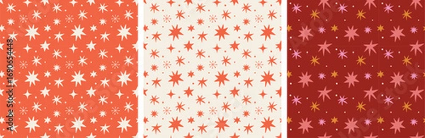 Fototapeta Christmas seamless red patterns with stars