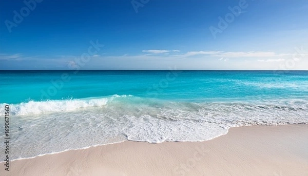 Obraz gentle turquoise ocean waves caress pristine white sand creating a serene and minimalist beach scene
