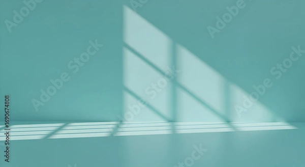 Fototapeta Sunlight streams through a window casting beautiful shadows on a serene light teal wall and floor, perfect for your next product photoshoot or design project.