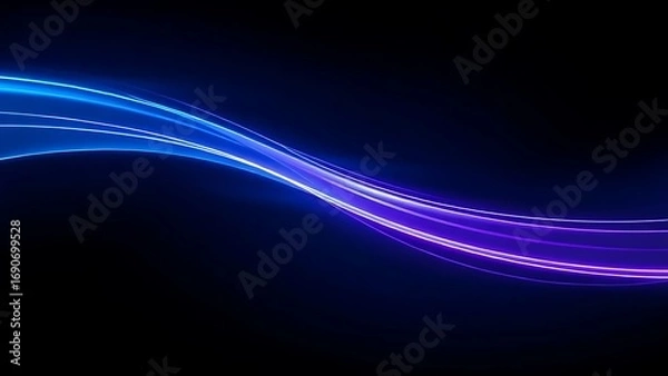 Fototapeta Vibrant blue and purple light trails swirling in a dark space, creating a futuristic and abstract atmosphere.