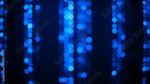 Fototapeta Abstract blue LED light patterns creating a futuristic ambiance on a dark background.