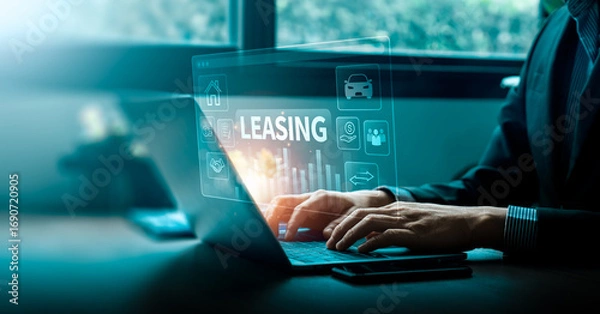 Fototapeta Businessman using digital leasing platform for car and property rental contract, online finance management, financial agreement, asset leasing, and modern investment service concept