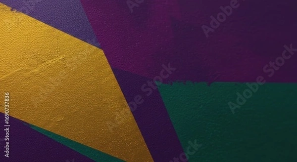 Fototapeta An abstract design of painted geometric shapes in shades of gold purple and green covers a textured wall