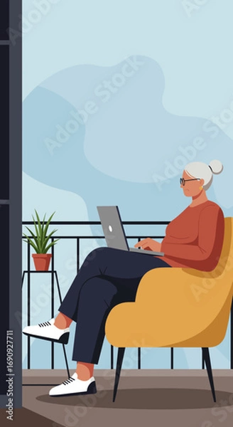 Fototapeta Senior woman working on a laptop from her apartment balcony, enjoying remote work and a relaxed lifestyle. Ideal for business, tech, or retirement concepts.