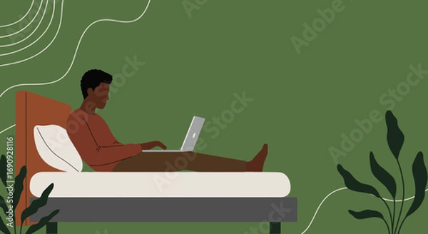 Fototapeta Relaxed man working remotely from bed on his laptop, embodying a modern work-from-home lifestyle with comfort and productivity.