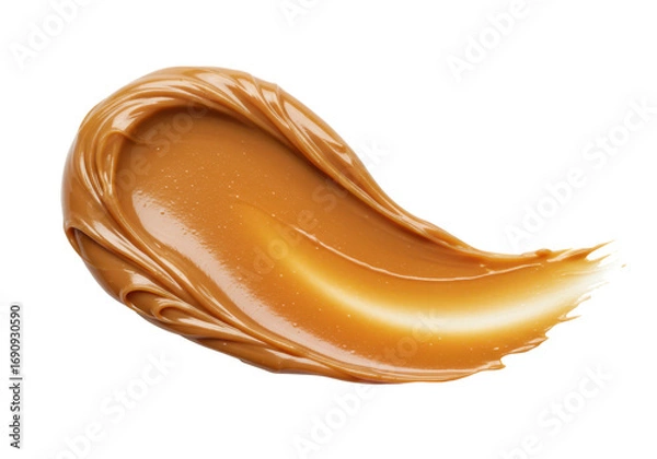 Fototapeta Smooth peanut butter spread in a swipe or swirl shape, isolated on white. Ideal for food design and cooking concepts.
