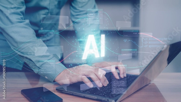 Fototapeta Businessman working on laptop with artificial intelligence (AI) hologram. Concept of future technology, data analysis, digital transformation, and innovation in business.