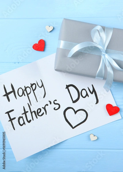 Fototapeta Background to the day of the father on a colored background top view.. Vertical photo format