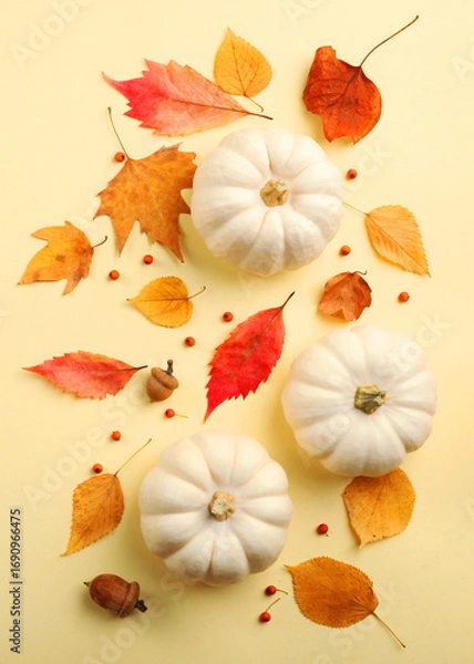 Fototapeta Beautiful autumn background with fallen leaves with place for text top view.. Vertical photo format