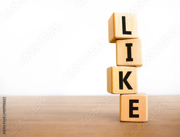 Fototapeta Like symbol. Concept word Like on beautiful wooden blocks. Beautiful wooden table white background. Business, lifestyle, support and like concept. Copy space.